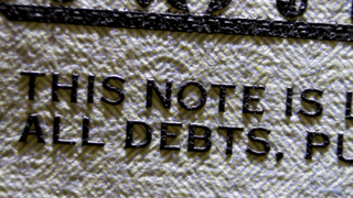 The ink in a one dollar bill is surprisingly thick under the microscope